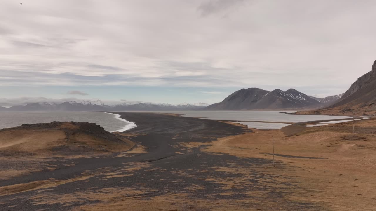 Black sand beach and rugged peaks of Stokksnes, Iceland, with Vestrahorn in the background.