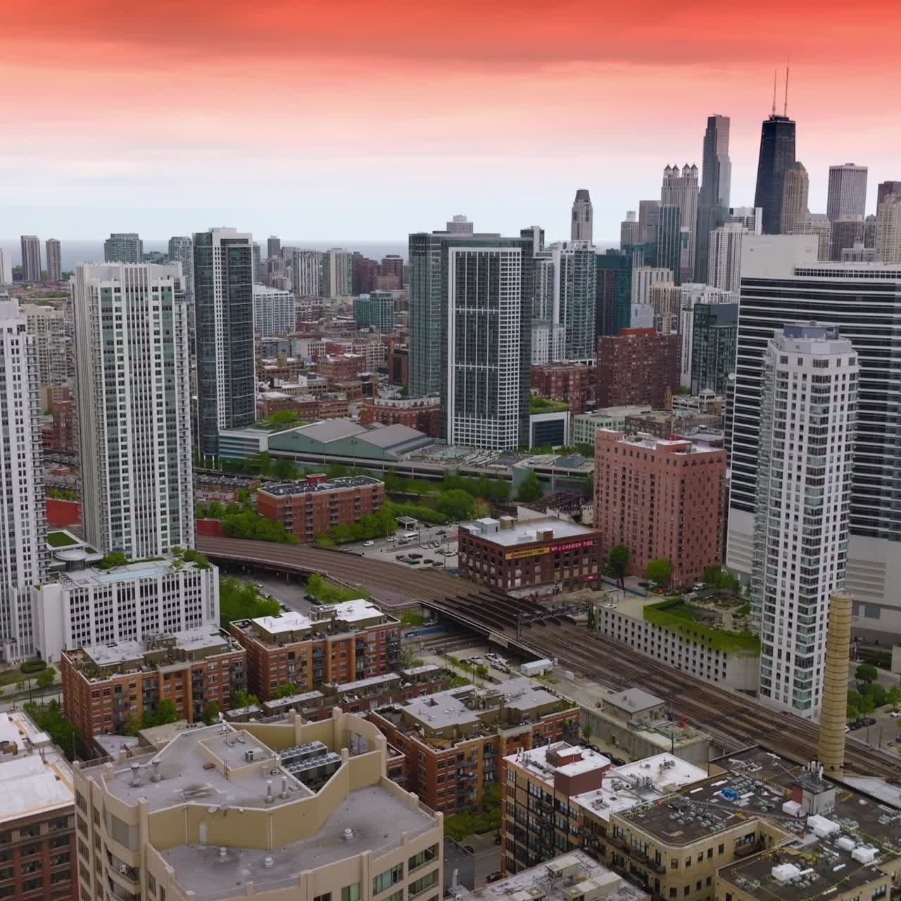 Urban cityscape of modern Chicago, Illinois. Beautiful city architecture at the backdrop of pink sky at sunset