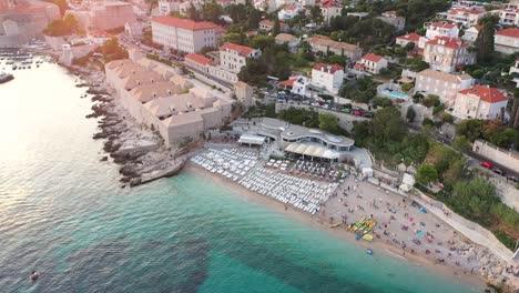 Aerial-shot-over-on-the-coast-of-Adriatic-Sea-in-Dubrovnik-Old-Town-during-sunset-,-Dalmatia,-Croatia