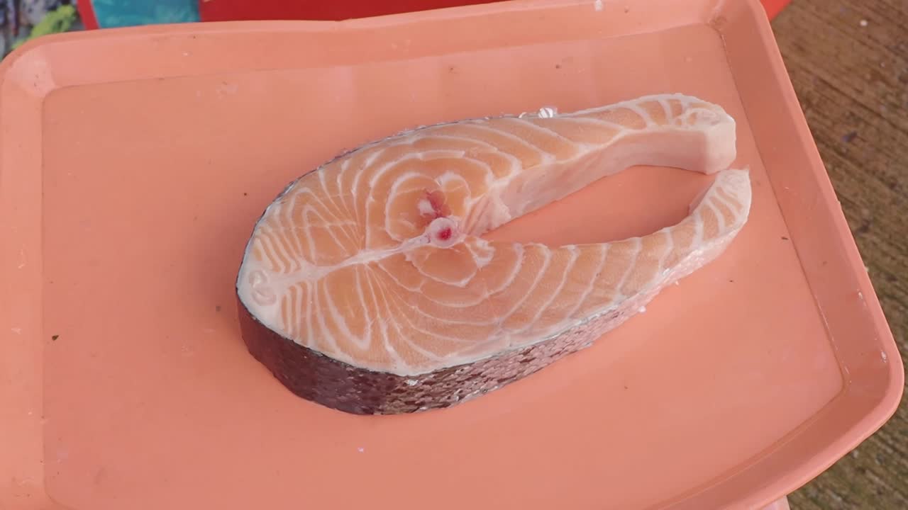 Fresh Salmon Slices on a Tray