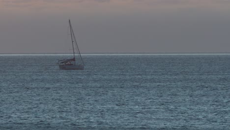 wide view sailboats and yacht sea in evening sunlight or sunrise over beautiful mountains coast, luxury summer adventure, active vacation in atlantic sea, portugal