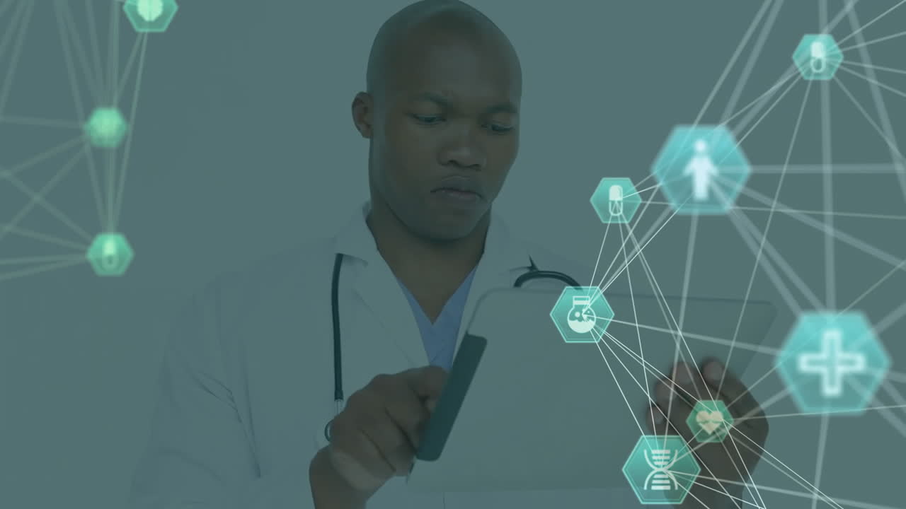 Animation of networks of medical icons over african american male using tablet