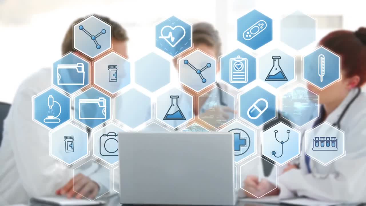 의사 들 의 팀 은 노트북 을 통해 여러 가지 아이콘 을 토론 하고 있다