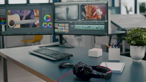 empty creative multimedia studio with professional computer placed on desk