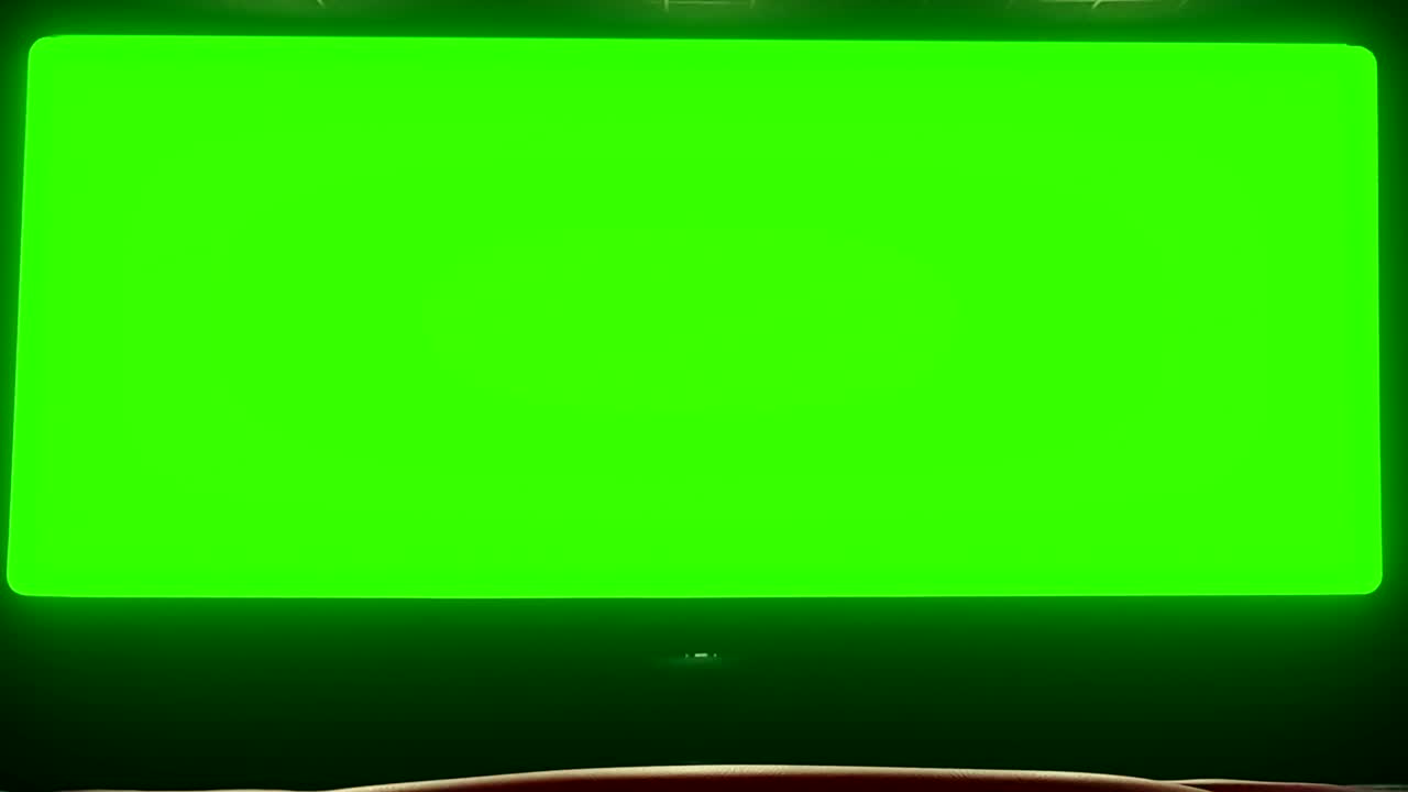 cinema interior of movie theatre with empty red seats with copyspace on the chroma key green screen and glow on edge, zoom in effect, concept of recreation