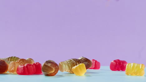 colorful gummy bears falling