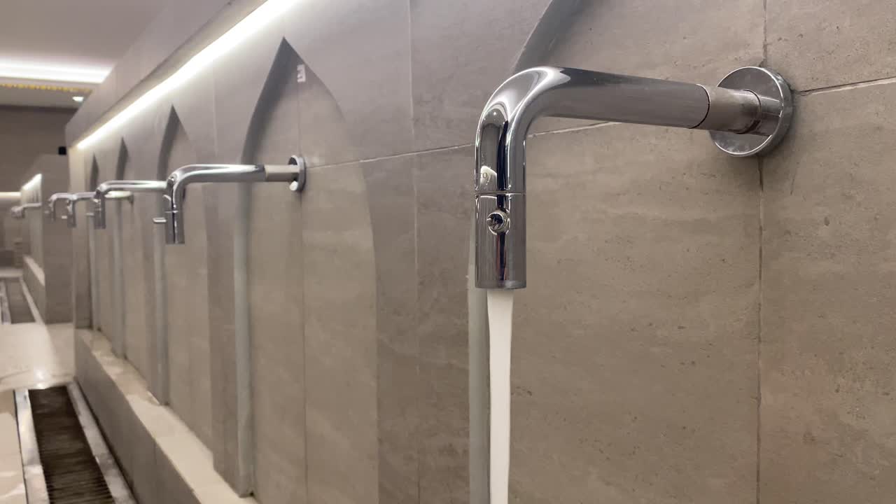 Aesthetic and modern ablution taps at the Sheikh Zayed Grand Mosque, Surakarta, Indonesia.