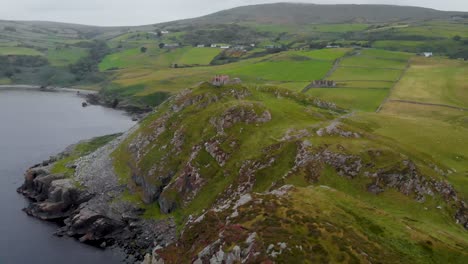 aerial footage of the coastline at torr head in northern ireland