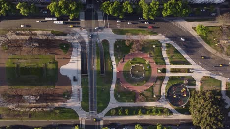 aerial top down view over traffic moving on streets around congress square