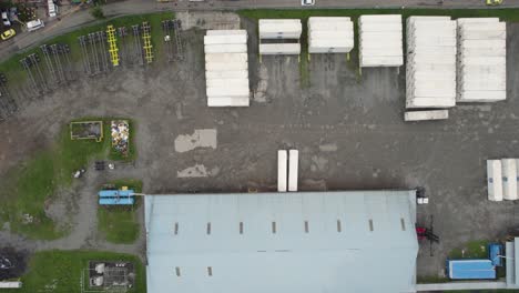 An-industrial-area-in-almirante-panama-showing-warehouses-and-storage-spaces,-aerial-view