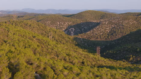 breathtaking aerial footage: drone captures majestic mountain valley at golden hour sunrise