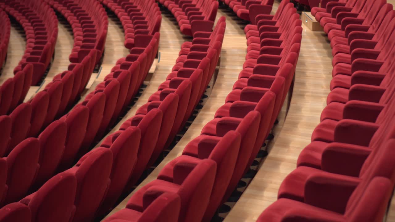 Red chairs of the empty theater