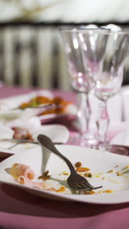 leftover food after party, dirty food. concept of the restaurant business. vertical video