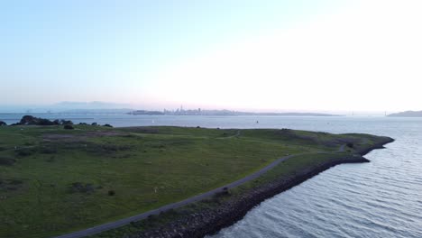 aerial drone footage of the berkeley marina at sunset