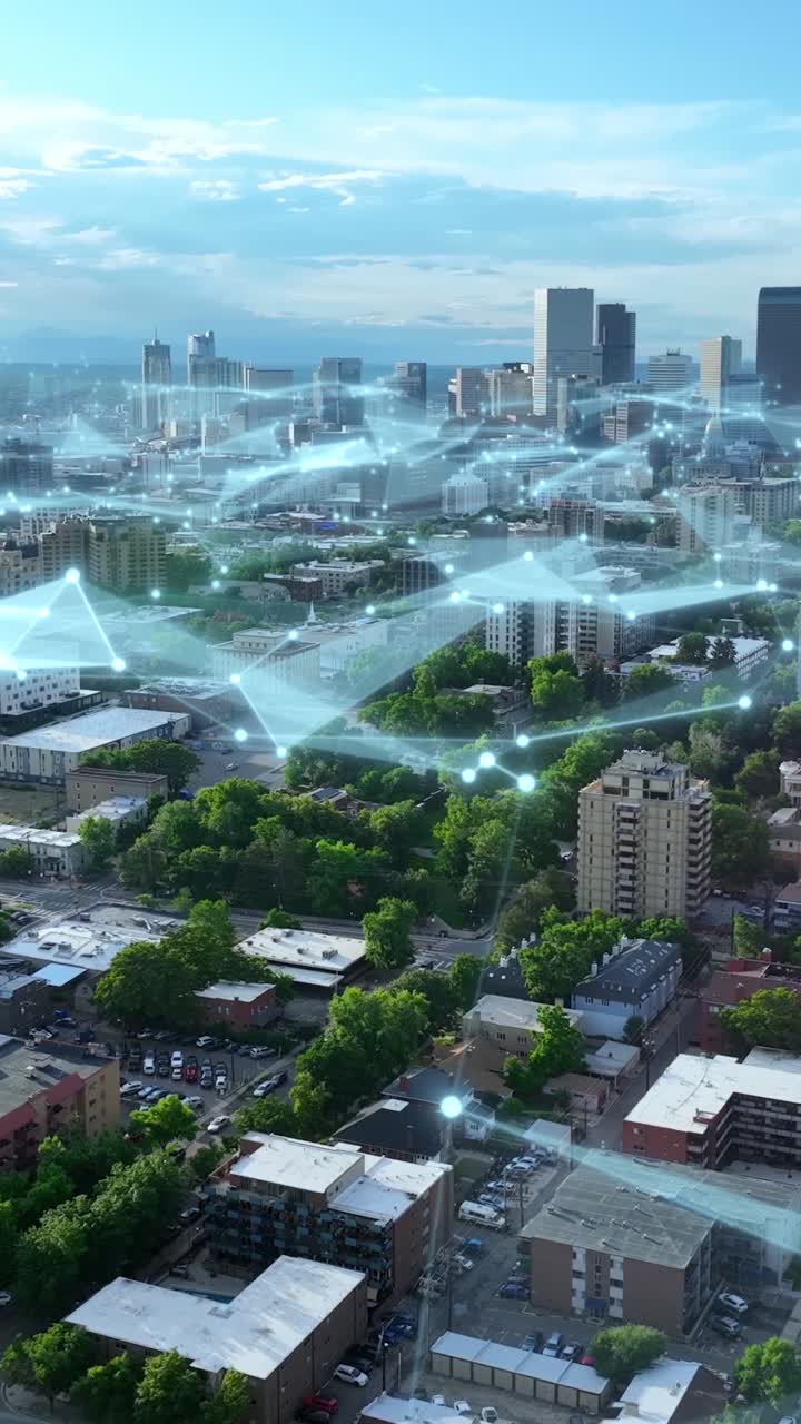 Veduta verticale dello skyline di Denver al tramonto con punti e linee collegati. Concetto di tecnologia smart city e crescita della rete. Ripresa aerea.