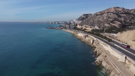 aerial view of the coastal road and walk north of the city of alicante, spain.