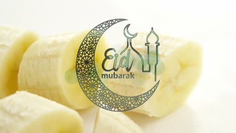 eid mubarak text animation over sliced bananas background