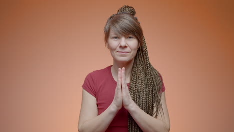 woman with braids and red shirt