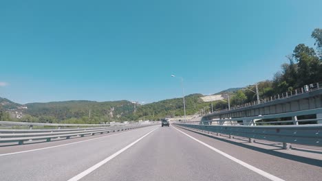 highway scenic drive with train bridge view