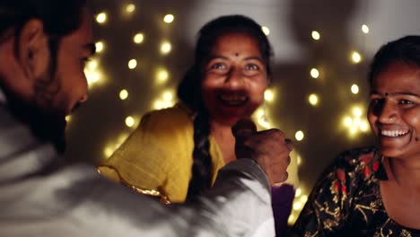 friends family decoarting for hindu festival of diwali