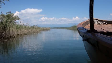 navigable canal in lake skadar or lake scutari, on the border of albania and montenegro