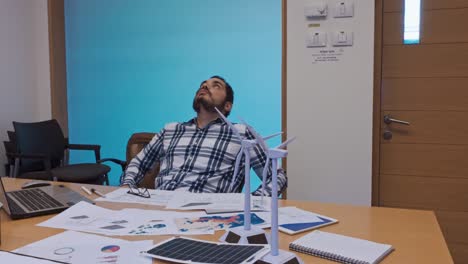 overwhelmed engineer taking a break from a demanding project