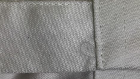 Macro-Shot-Of-Sewn-Plain-Gray-Polyester-Textile