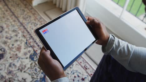 composite of man sitting at home watching football match on tablet