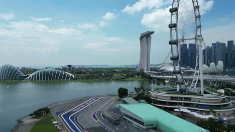 drone shot orbiting turn 1 of singapore formula 1 track