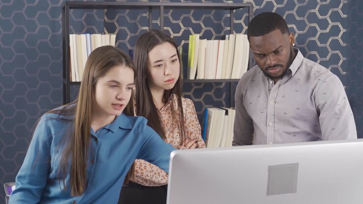 Multiethnic people working together in office, working in team.