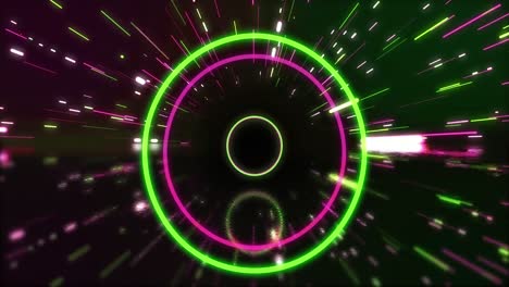 Animation-of-green-and-pink-neon-circles-and-light-trails-on-black-background