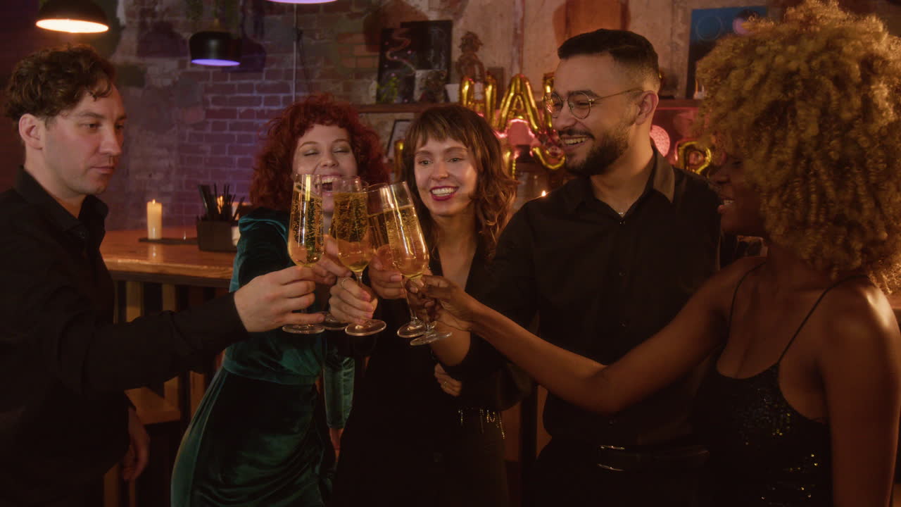 Group of friends celebrating with champagne