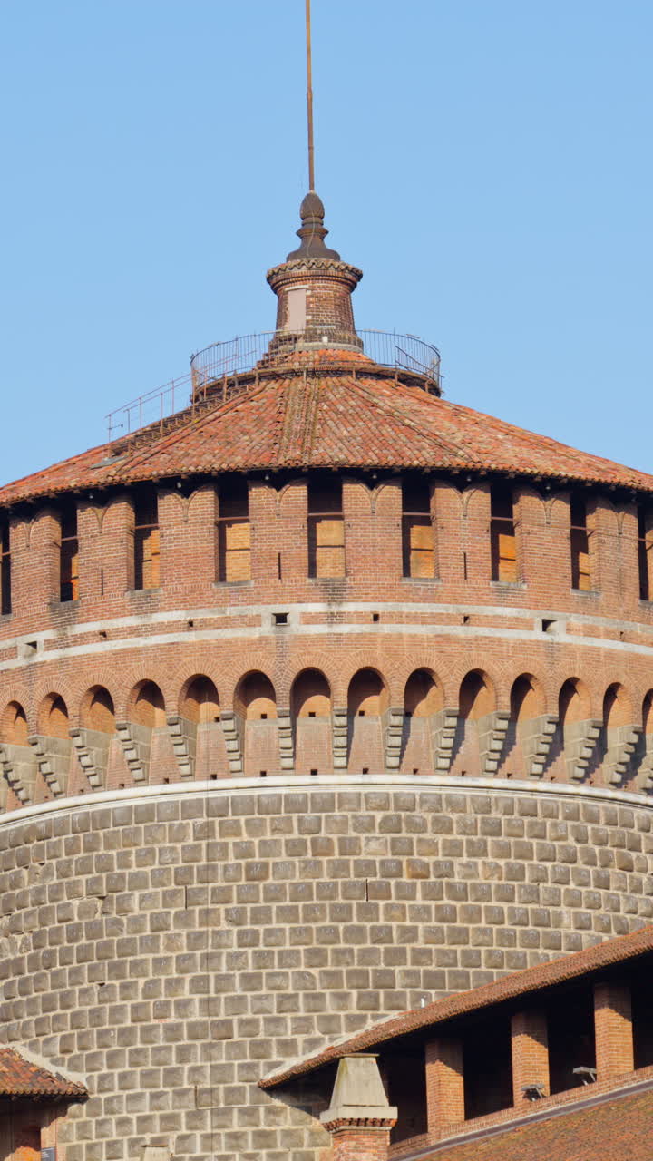 Close up of the Sforzesco Castle over a blue sky in daylight. Vertical