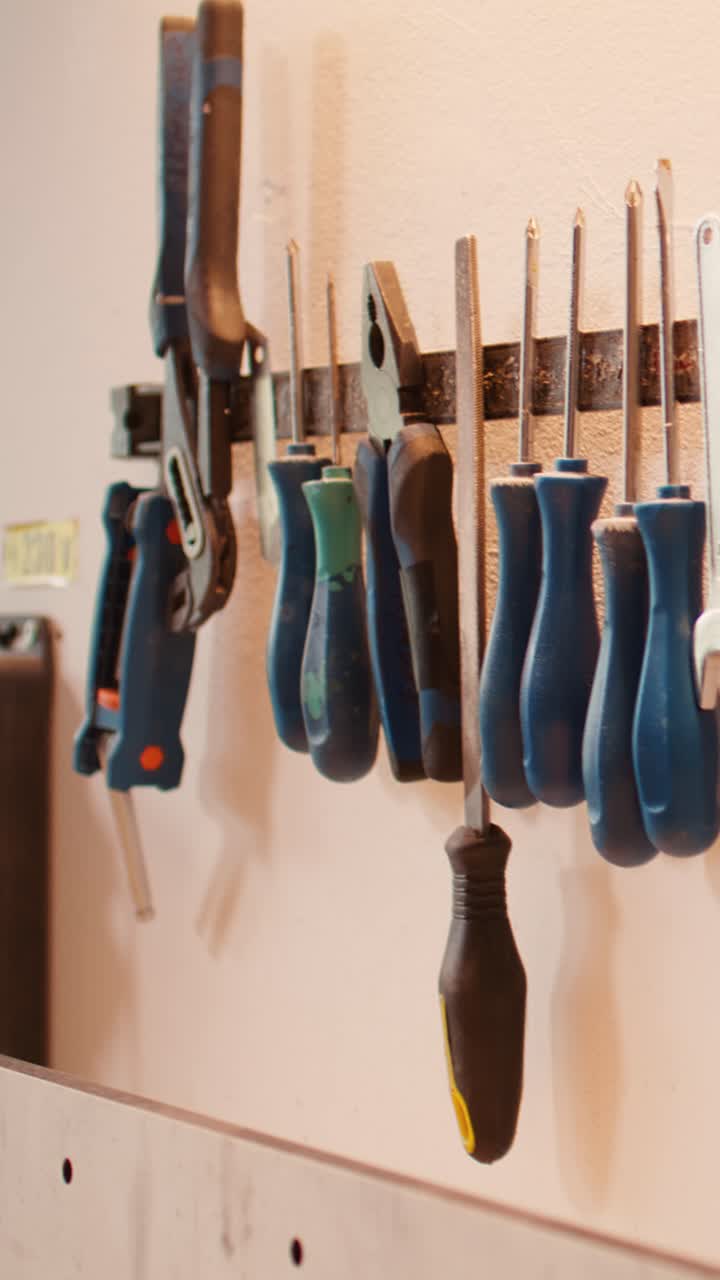 Collection of Hand Tools Organized on a Workshop Wall