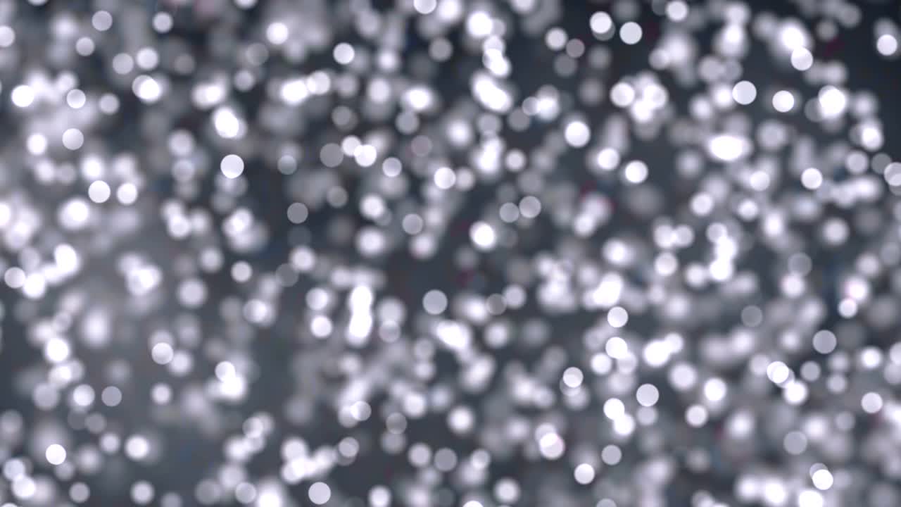 el brillo digital de navidad enciende partículas de color plateado el bokeh fluye sobre fondo plateado, vacaciones xmas festivo feliz año nuevo