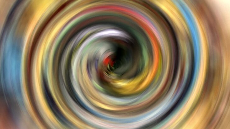 Background motion graphic loop of multicolored artistic spiral rotates with psychedelic twisting circles. 4K 3D seamless animation loop. Abstract round striped swirling hypnotic rotating art effect.