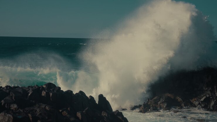 Powerful Waves Crashing on Rocky Coastline