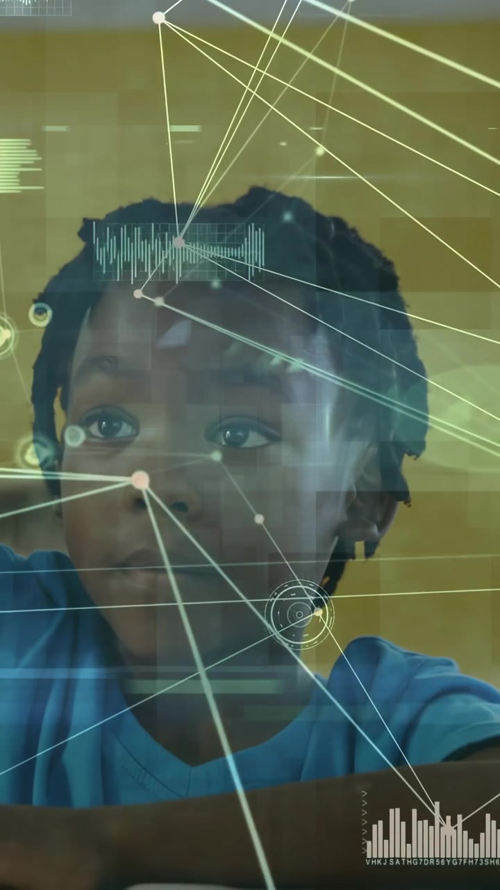 Vertical video: Boy at desk, tracking HUD as nodes and waves appear, reaching into learning charts