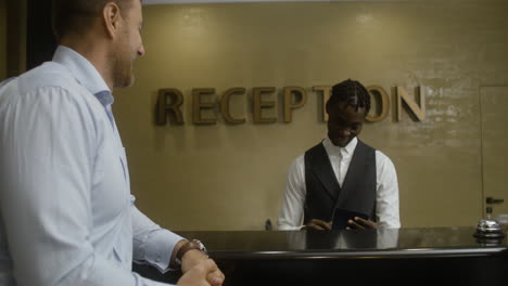 receptionist talking with guests