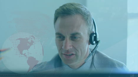 animation of caucasian man wearing headset and using computer over globe spinning