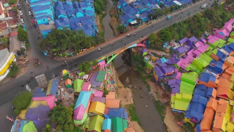 Top-down-view-of-rainbow-village-jodipan-Malang-with-bright-colours,-aerial