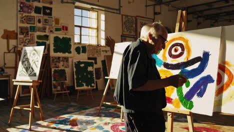 senior artist in a studio