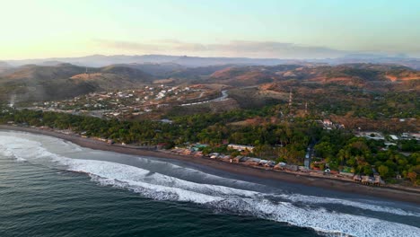 Incredible-drone-shot-tropical-beach-on-coast-of-El-Salvador-at-sunset