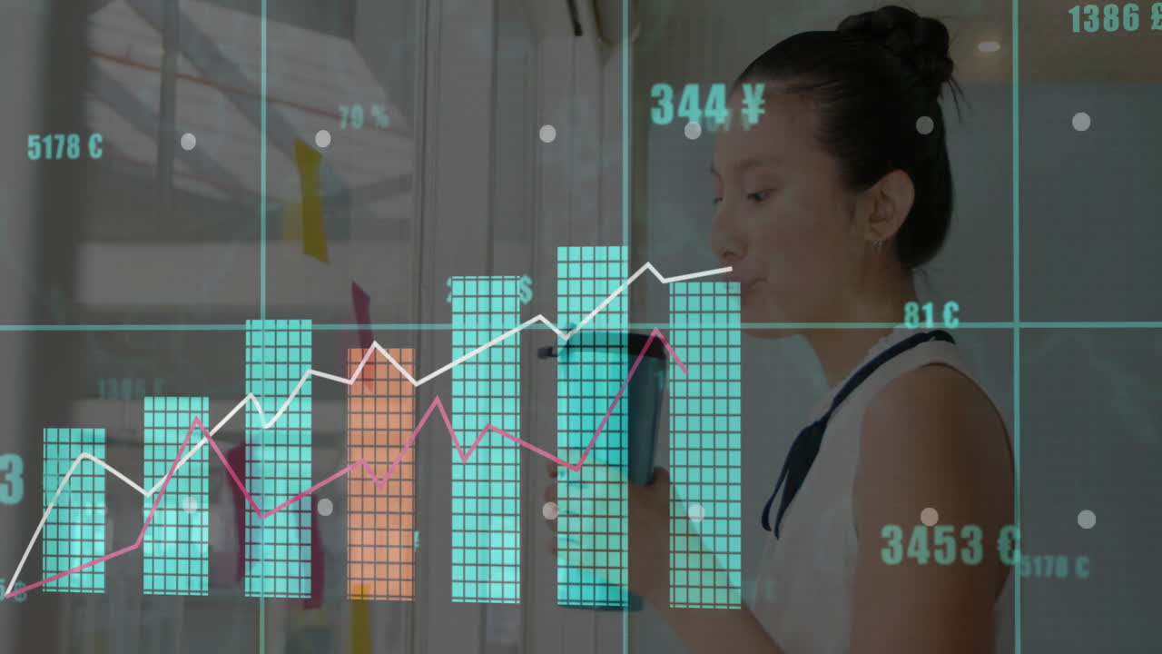 Analyzing financial graphs and animation, businesswoman working in modern office