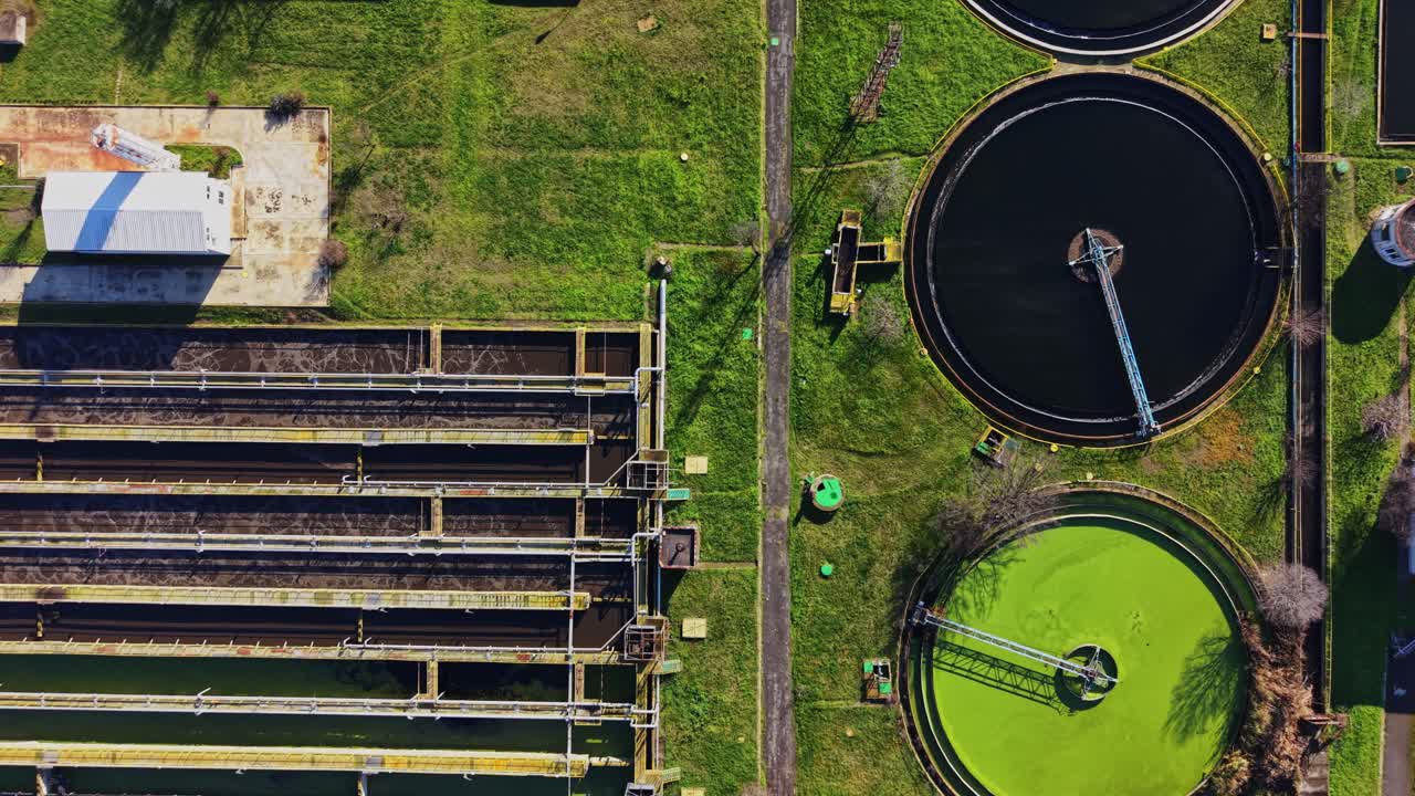 View of water treatment facility with tanks and infrastructure