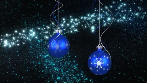 Animation-of-christmas-bubbles-over-stars-on-dark-background