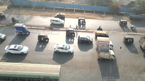 early morning vehicles moving traffic signal to view in kashimira highway in mumbai western express highway