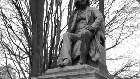 chevreul statue at jardin des plantes d'angers in france - black and white, tilt up