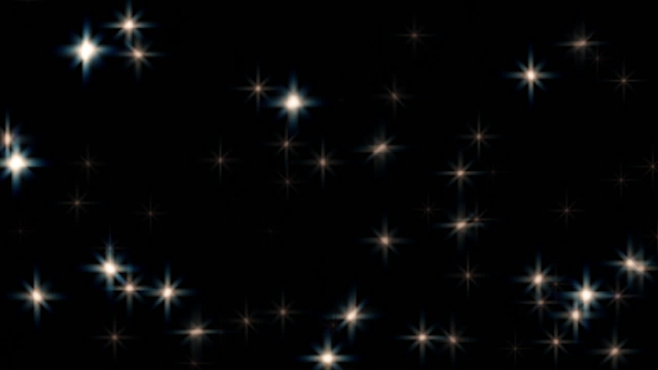 Glittering sparks isolated on black background