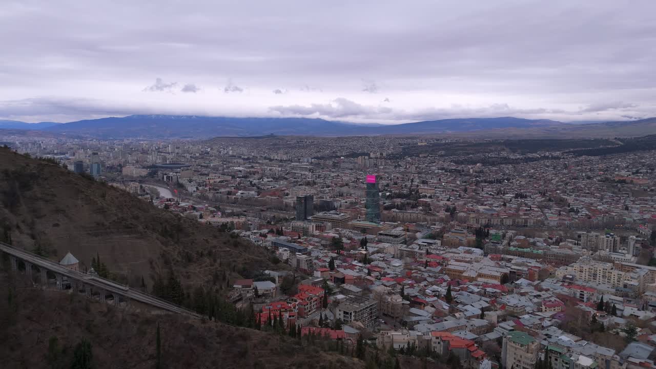 Aerial View Of Tbilisi City Buildings From Mtatsminda Park In Georgia. - pullback shot